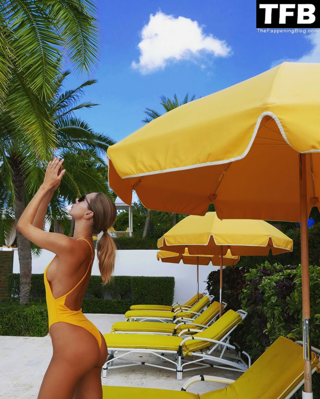 Kimberley Garner Displays Her Stunning Sideboob and Ass in a Yellow Swimsuit (9 Photos)