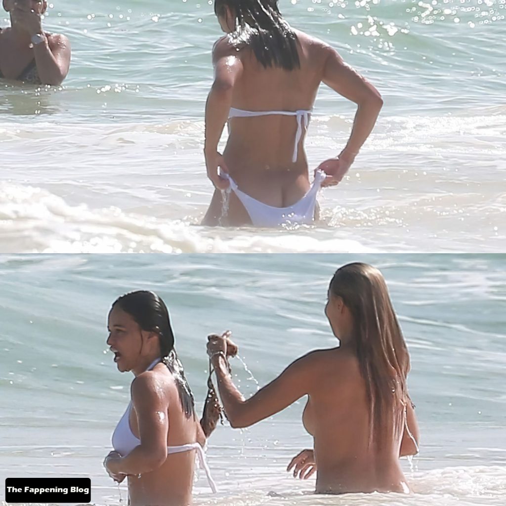 Michelle Rodriguez shows a bit too much on white bikini while vacationing w...
