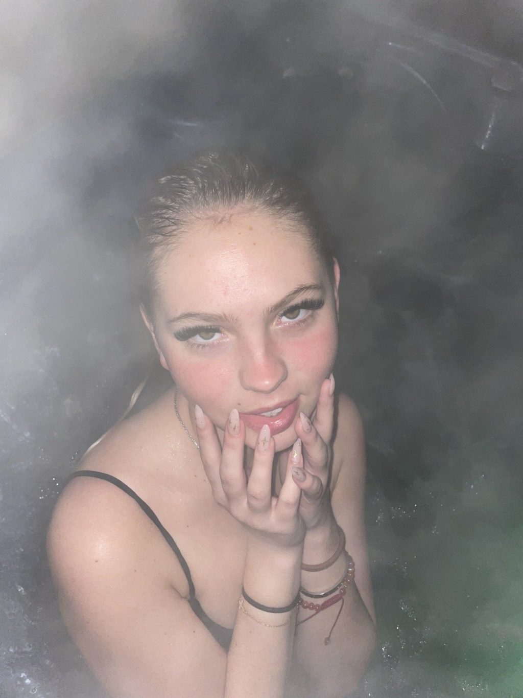 Jordyn Jones Shows Off Her Stunning Body in a Tiny Bikini in Hot Tub (9 Photos)
