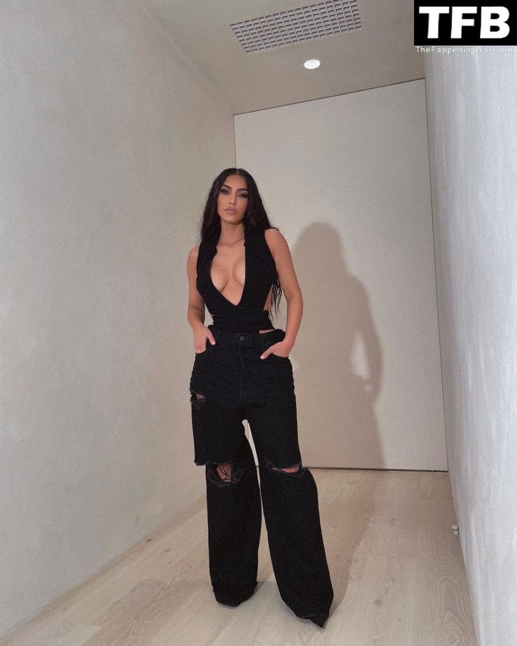 Kim Kardashian Puts Her Big Boobs on Display (7 Photos)