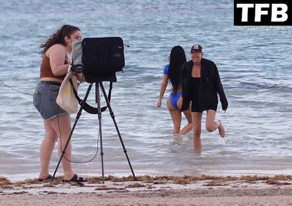 Kim Kardashian Shows Off Her Sensational Curves on the Beach (16 Photos)