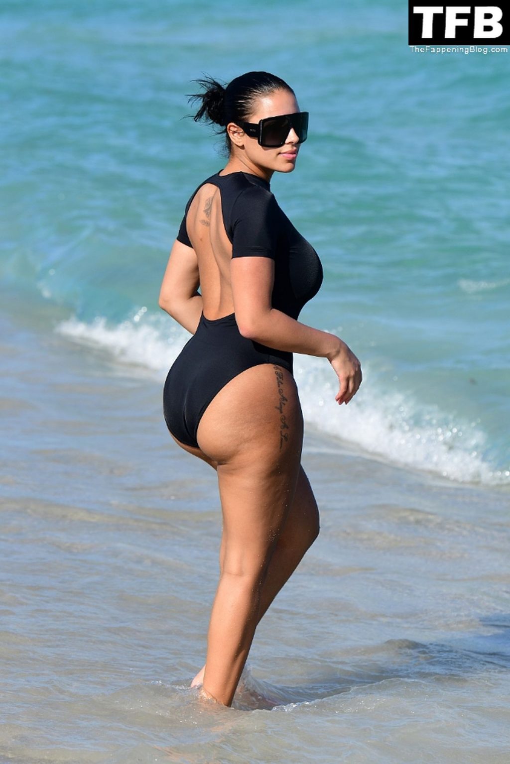 Chaney Jones Shows Off Her Curves on The Beach (24 Photos)