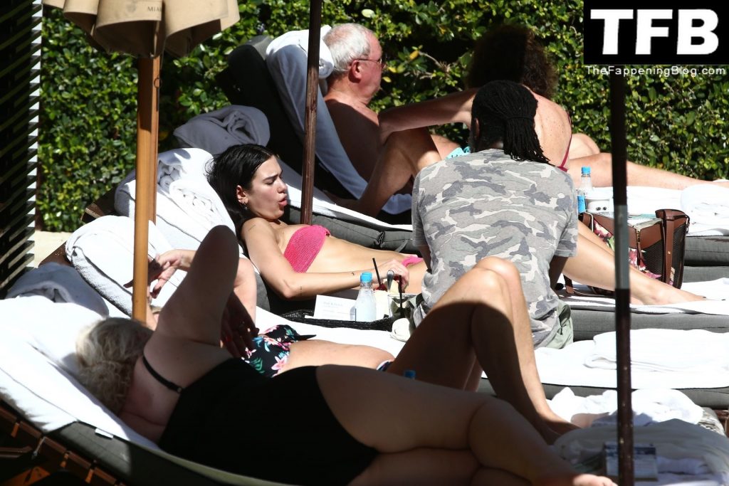 Dua Lipa Wears a Hot Pink Bikini as She Relaxes by the Pool with a Mystery Man in Miami (51 Photos)