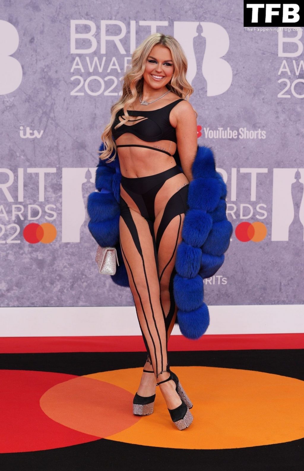 Tallia Storm Flaunts Her Sexy Figure in a Risqué Black Top and Cutout Trousers at The BRIT Awards (18 Photos)