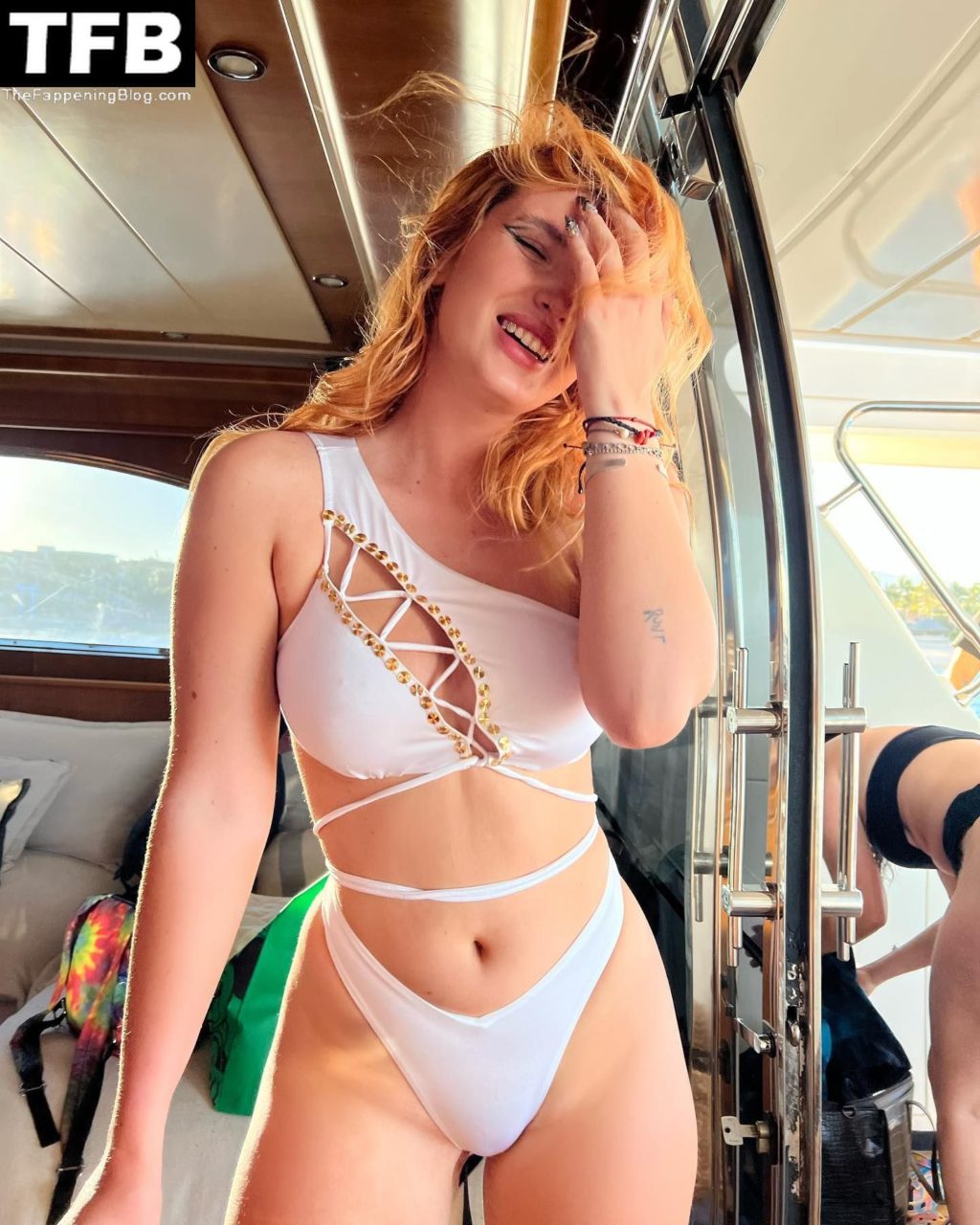 Bella Thorne Looks Hot in a White Bikini (6 Photos)