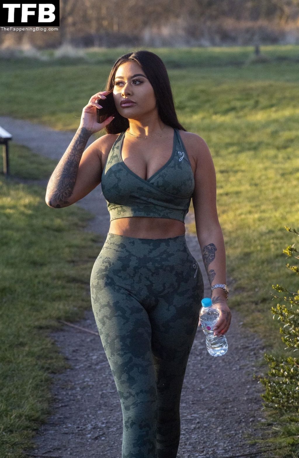 Nikita Jasmine Shows Off Her Ample Cleavage in a Camouflage Exercise Outfit (10 Photos)
