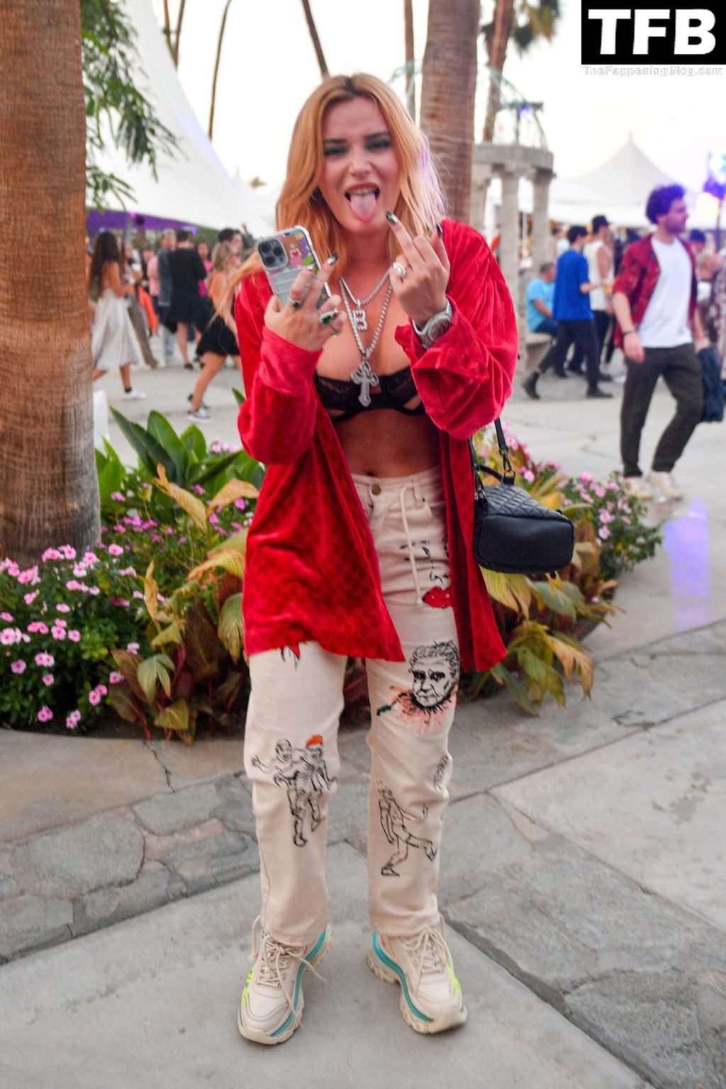 Bella Thorne is Seen at Coachella’s Neon Festival (25 Photos)