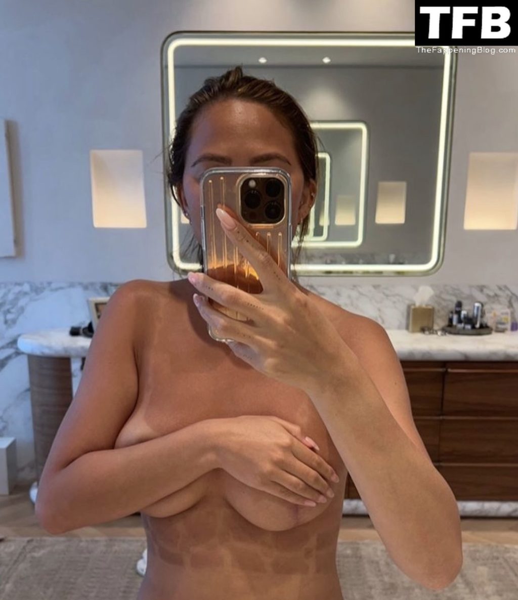 Chrissy Teigen Topless (2 Photos)