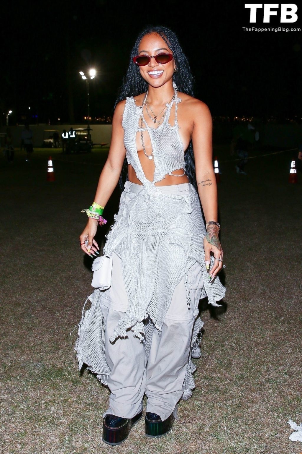 Karrueche Tran Flashes Her Nude Tits as She Exits Day One of Coachella (26 Photos)
