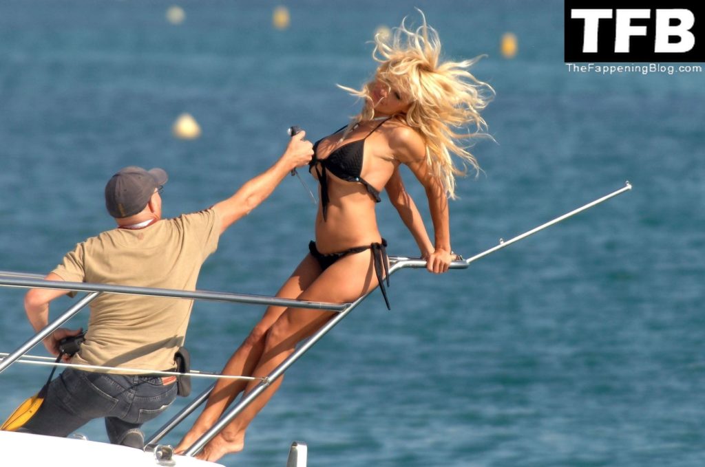 Pamela Anderson Poses Topless and in a Bikini on a Boat in Cannes (55 Photos)