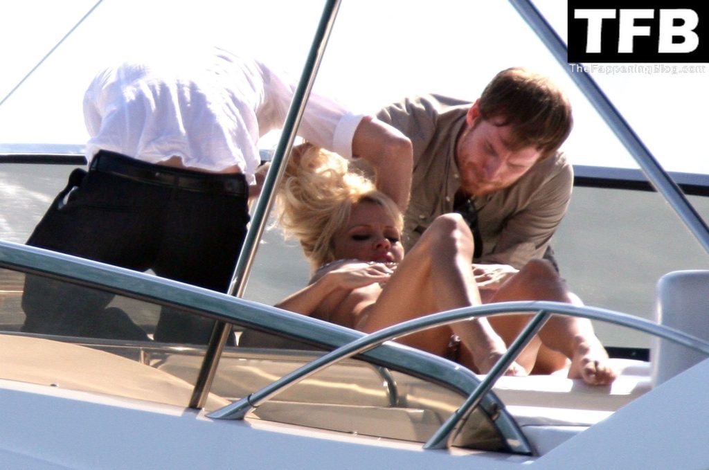 Pamela Anderson Poses Topless and in a Bikini on a Boat in Cannes (55 Photos)
