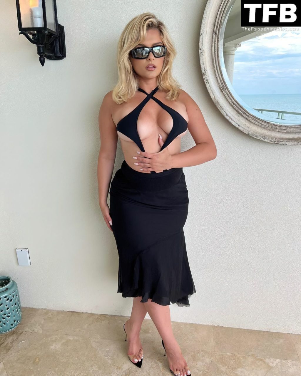 Bebe Rexha Shows Off Her Curves as She Poses in a Swimsuit (4 Photos)