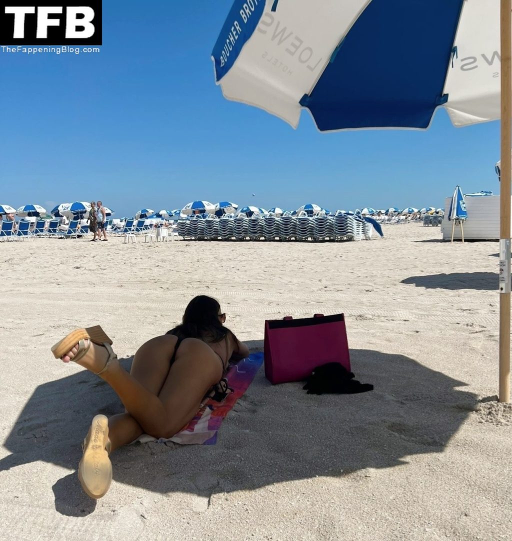 Claudia Romani Shows Off Her Curves on the Beach (17 Photos)