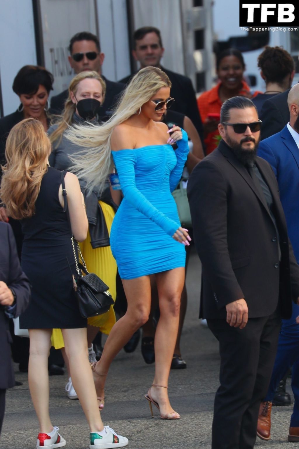 Khloe Kardashian Displays Her Curves in a Turquoise Dress (12 Photos)