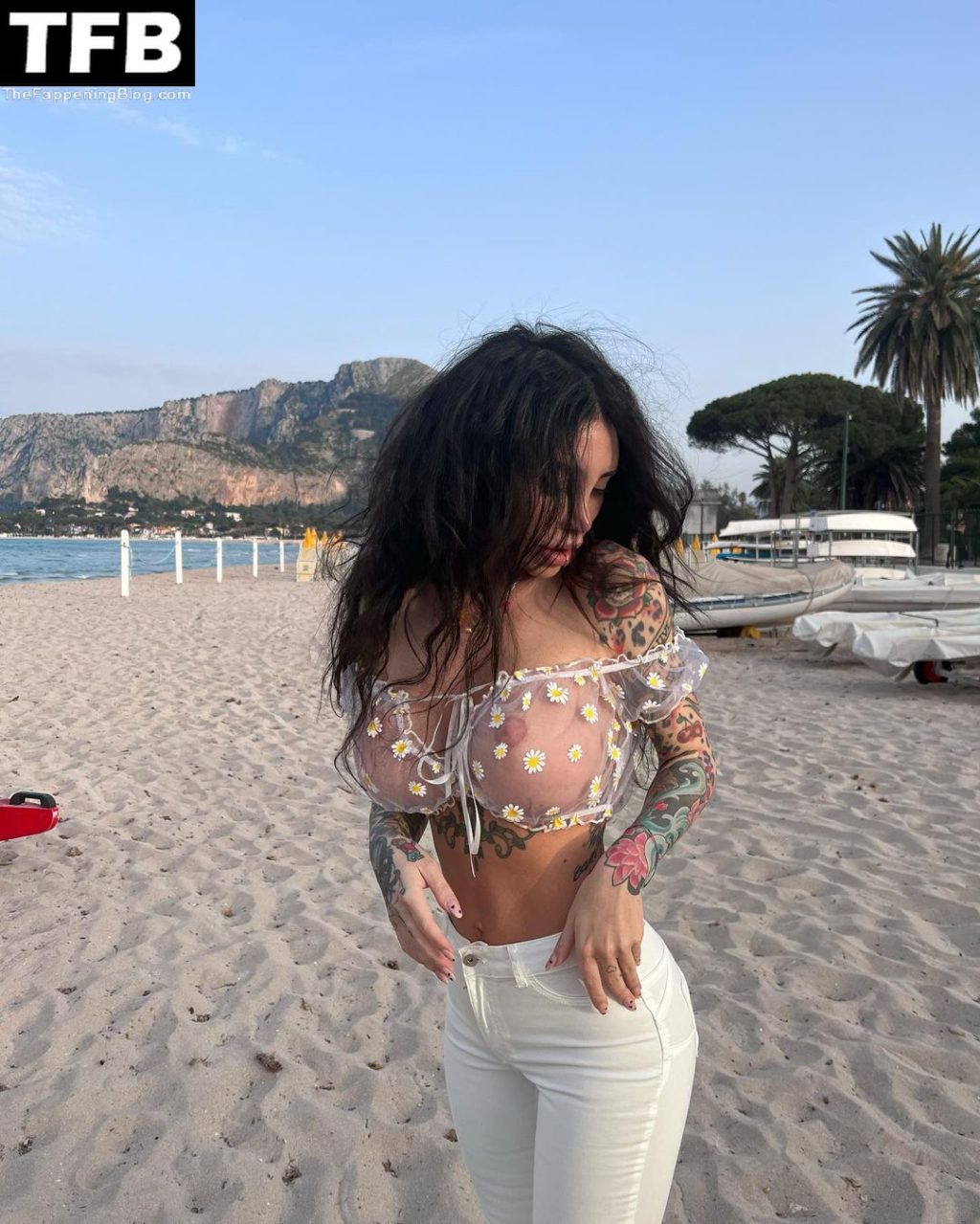 Alexis Mucci Shows Off Her Nude Boobs on the Beach (10 Photos)