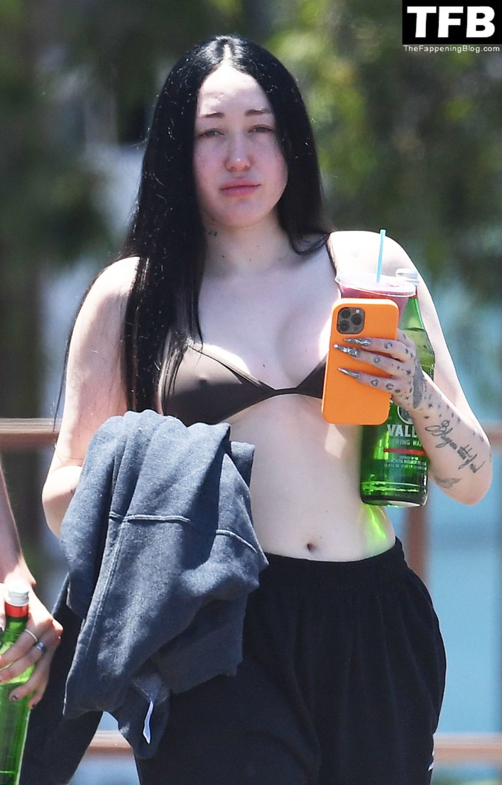 Noah Cyrus Slips Into a Bikini Top Cooling Off From the Sweltering Heat with Her Boyfriend in LA (17 Photos)