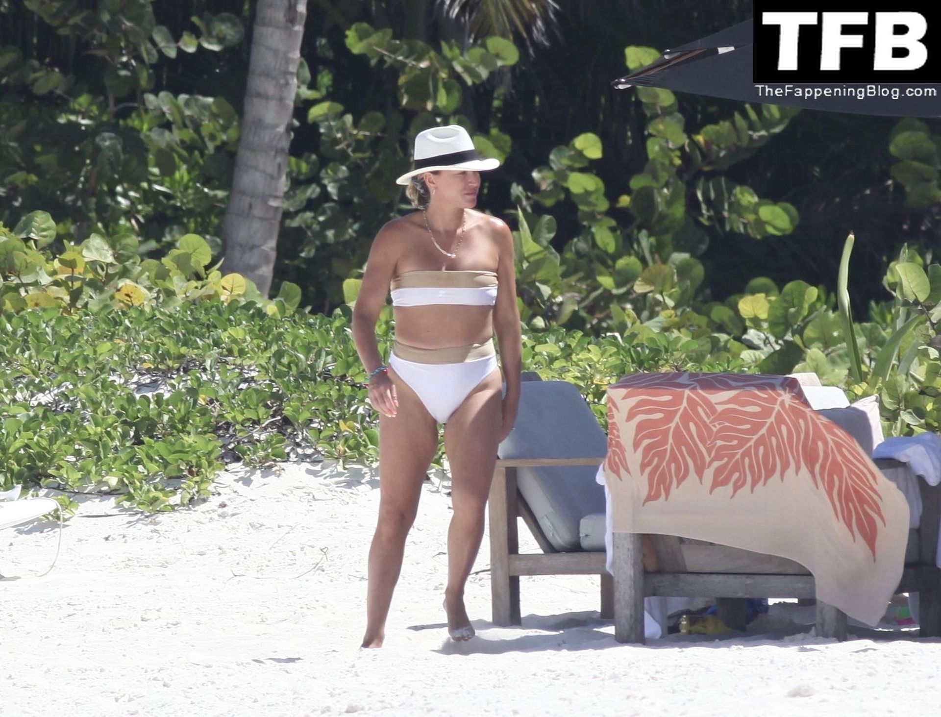 Teddi Mellencamp Looks Sexy in a White Bikini as She Hits the Beach in Mexi...