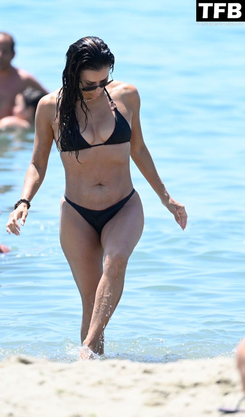 Eva Longoria Shows Off Her Sexy Bikini Body on the Beach in Marbella (14 Photos)