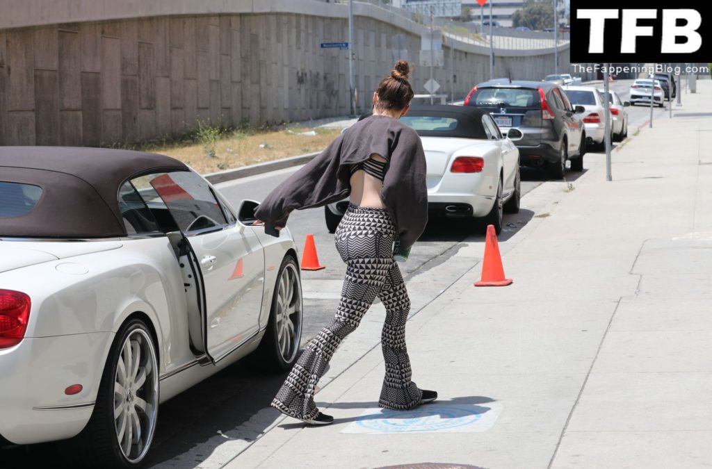 Jennifer Lopez Showcases Her World Famous Derriere in Funky Bell Bottom Leggings (72 Photos)
