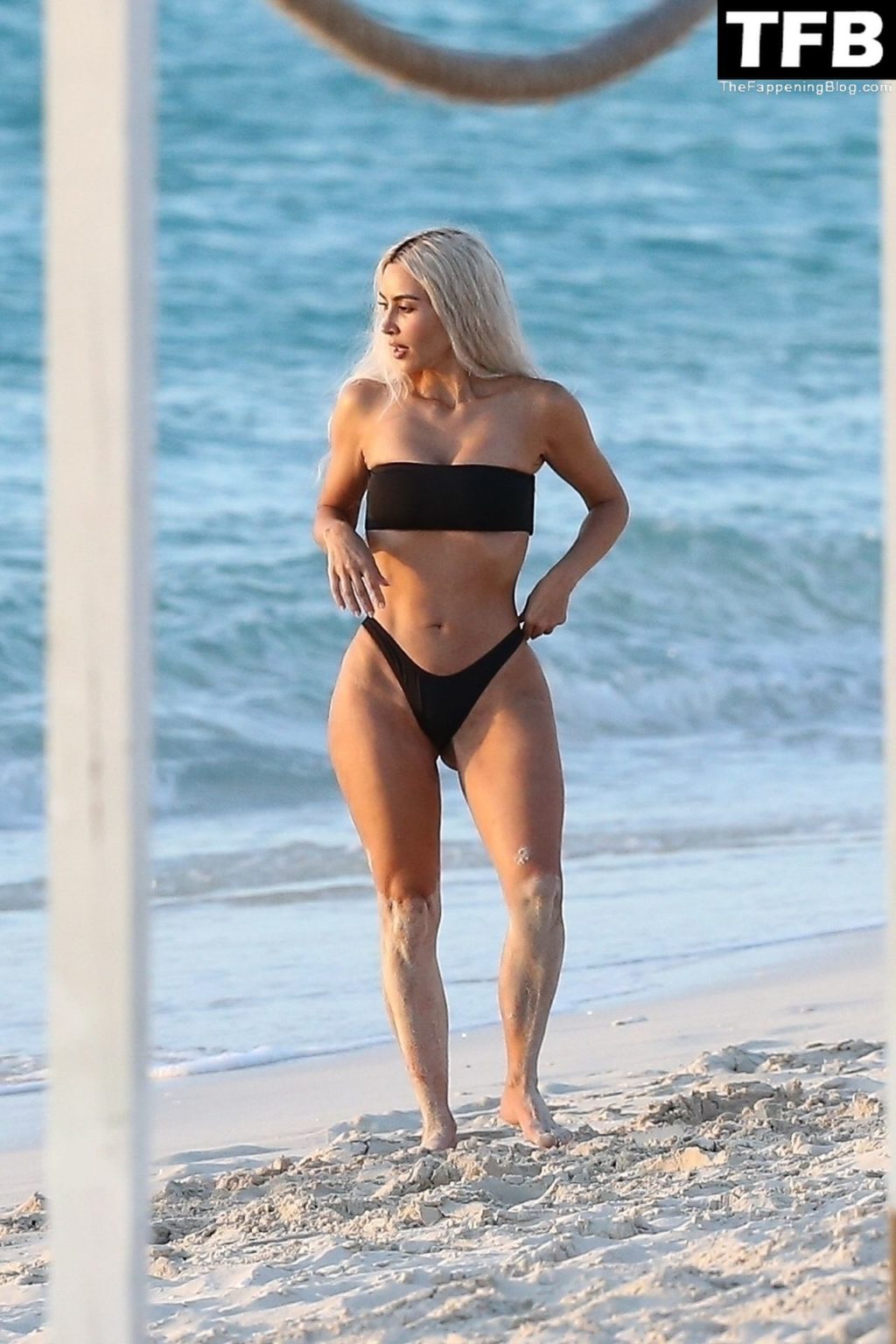 Kim Kardashian Enjoys a Sweet Moment on the Beach During a Family Vacation to Turks and Caicos (11 Photos)