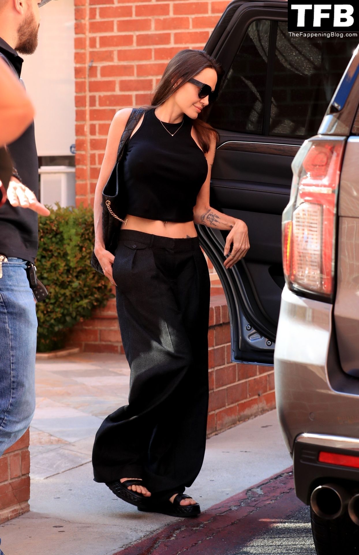 Angelina Jolie Shows Off Her Tight Tummy Leaving an Office Building (33 Photos)