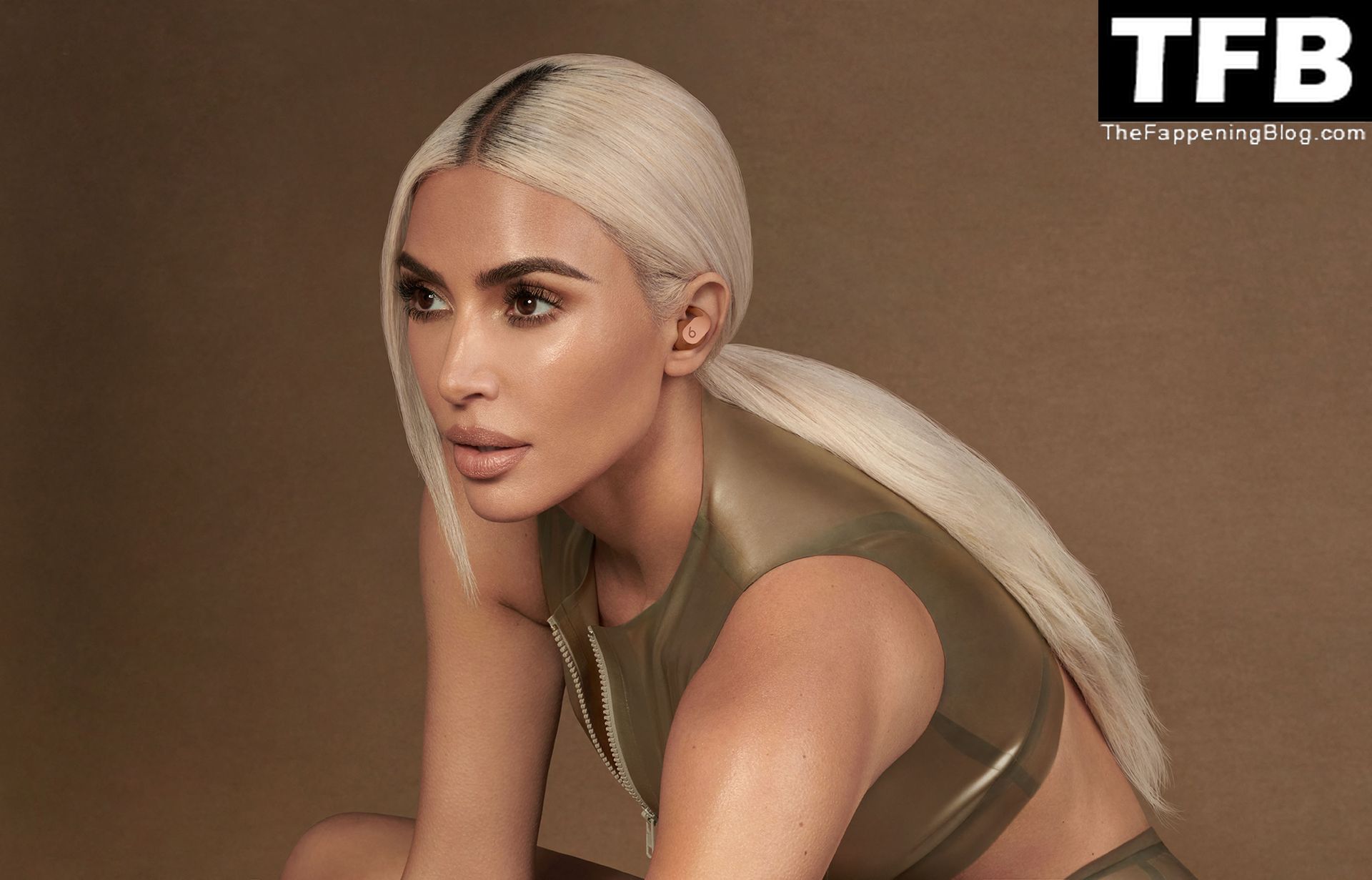 Kim Kardashian Promotes “Beats x Kim” Wireless Airbuds in a Sexy Shoot (9 Photos)