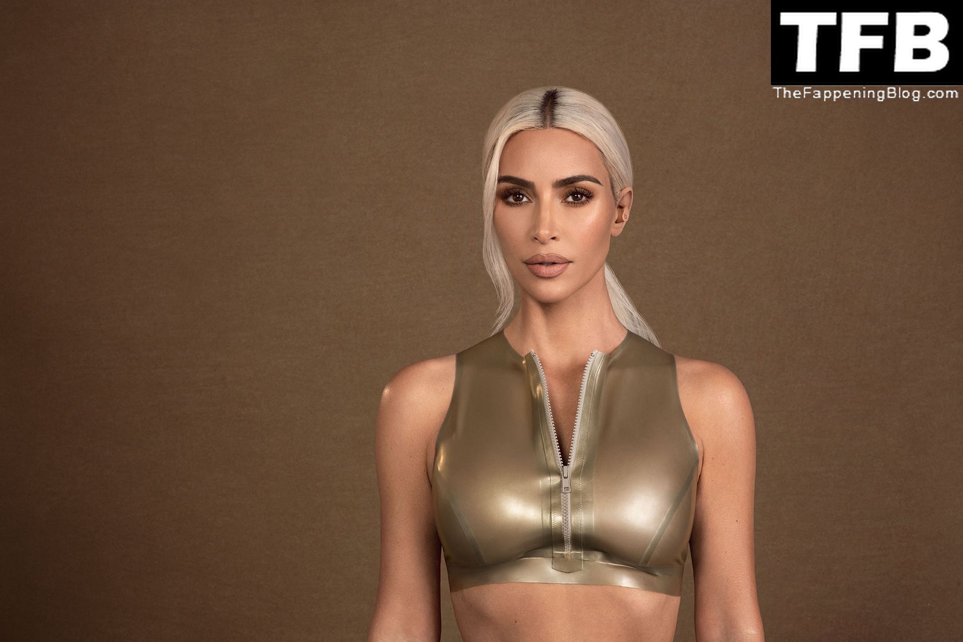 Kim Kardashian Promotes “Beats x Kim” Wireless Airbuds in a Sexy Shoot (9 Photos)