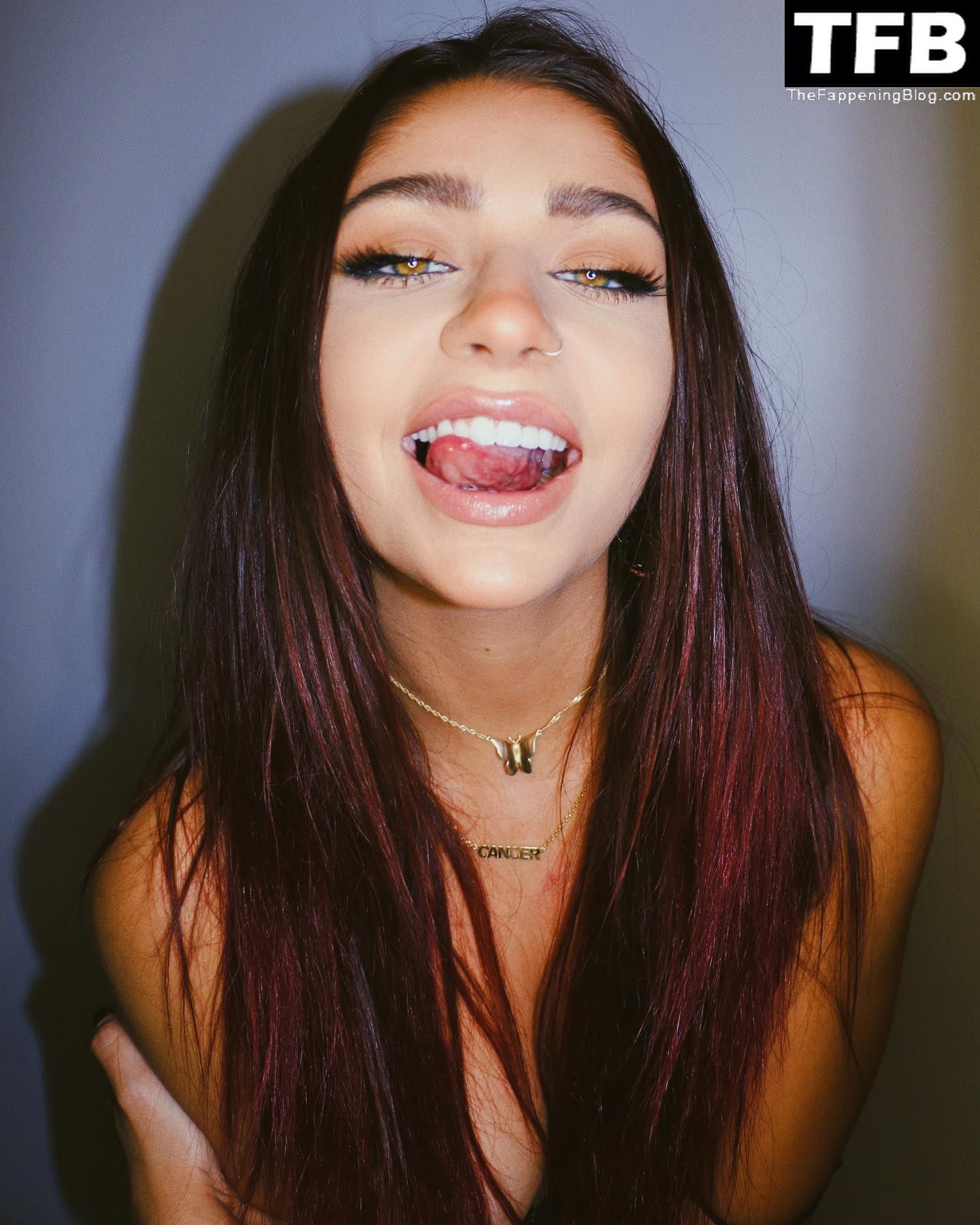 Check out Andrea Russett’s topless and sexy photos from events and her soci...