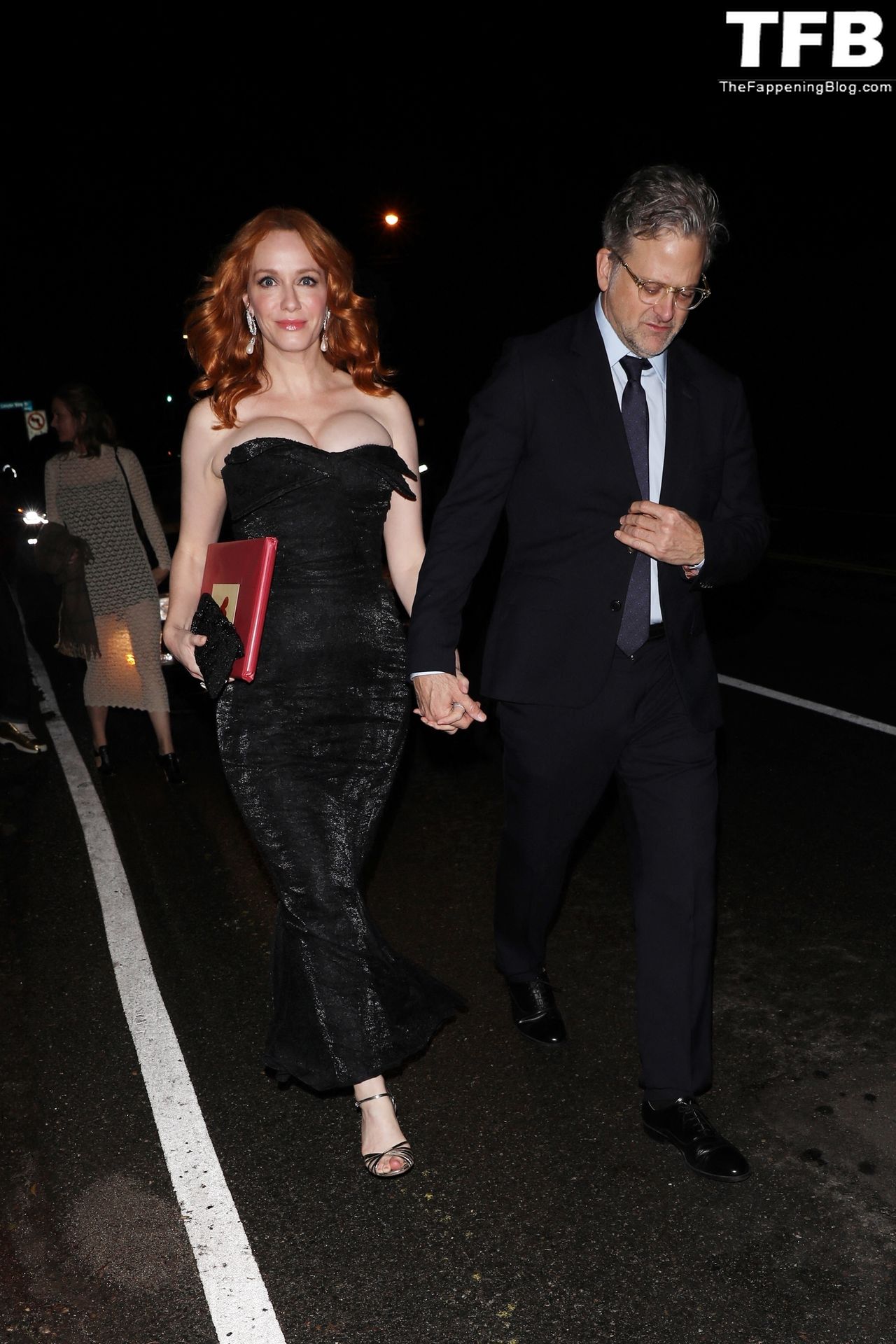 Christina Hendricks Displays Her Sexy Boobs as She Attends the Jennifer Klein’s Day of Indulgence Holiday Party (16 Photos)