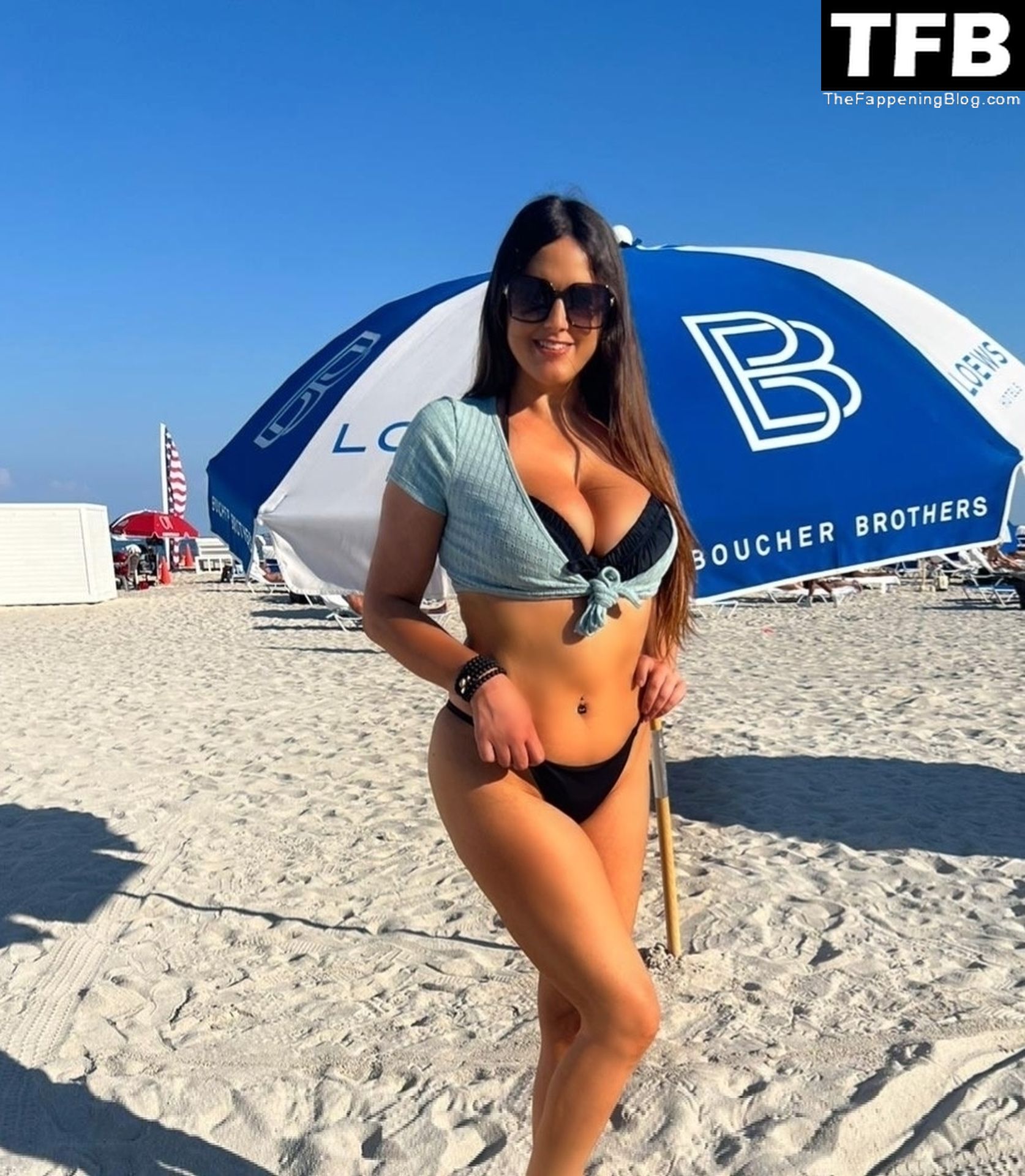 Claudia Romani Hits the Beach in Miami (9 Photos)