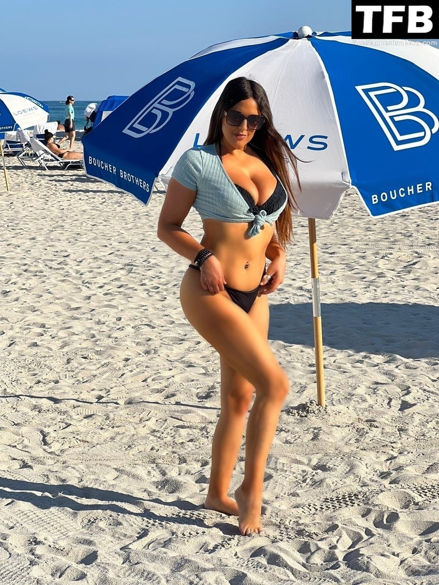 Claudia Romani Hits the Beach in Miami (9 Photos)