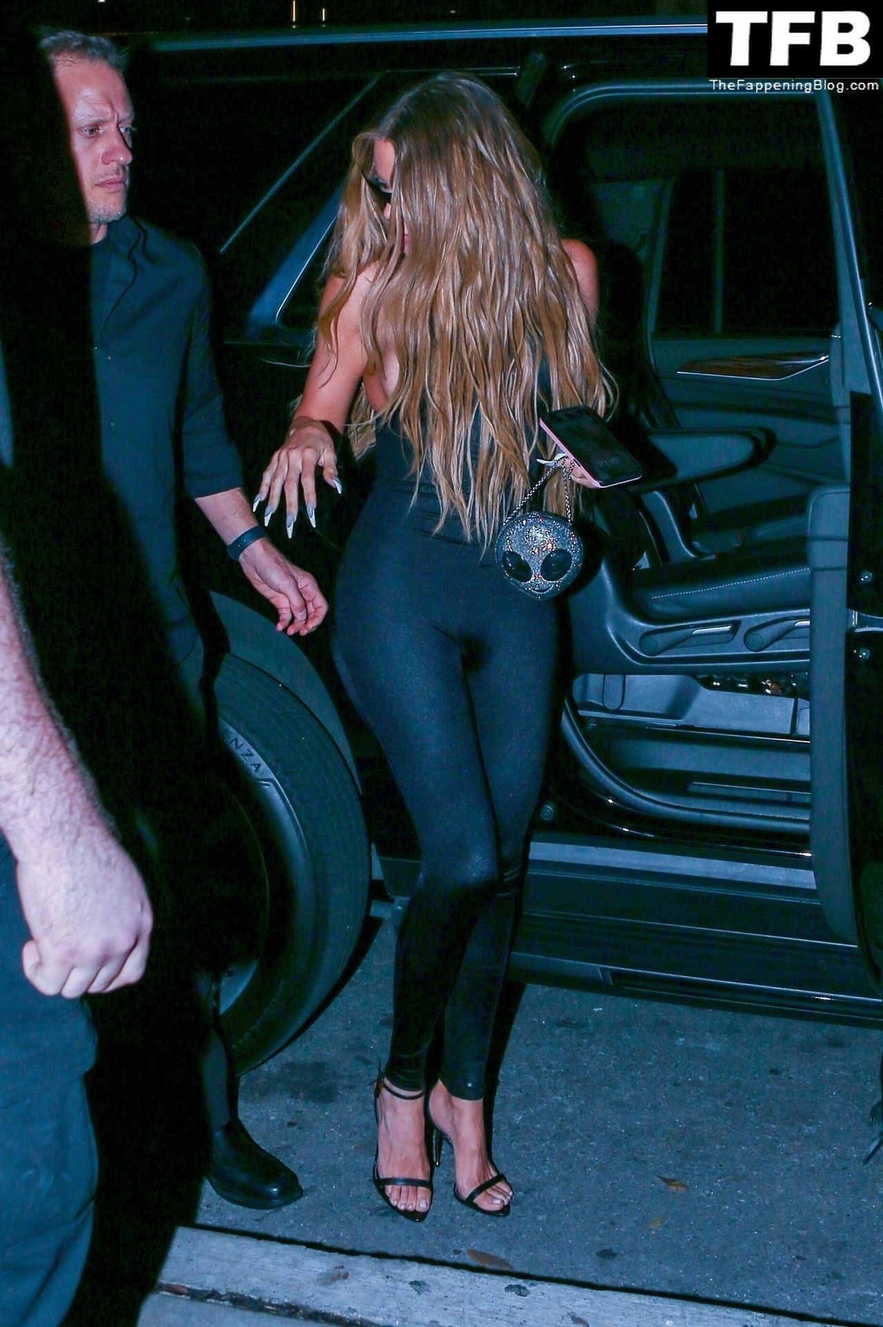 Kim Kardashian Brings Out Her Famous Curves for a Dinner Date in Miami with Khloe Kardashian (12 Photos)
