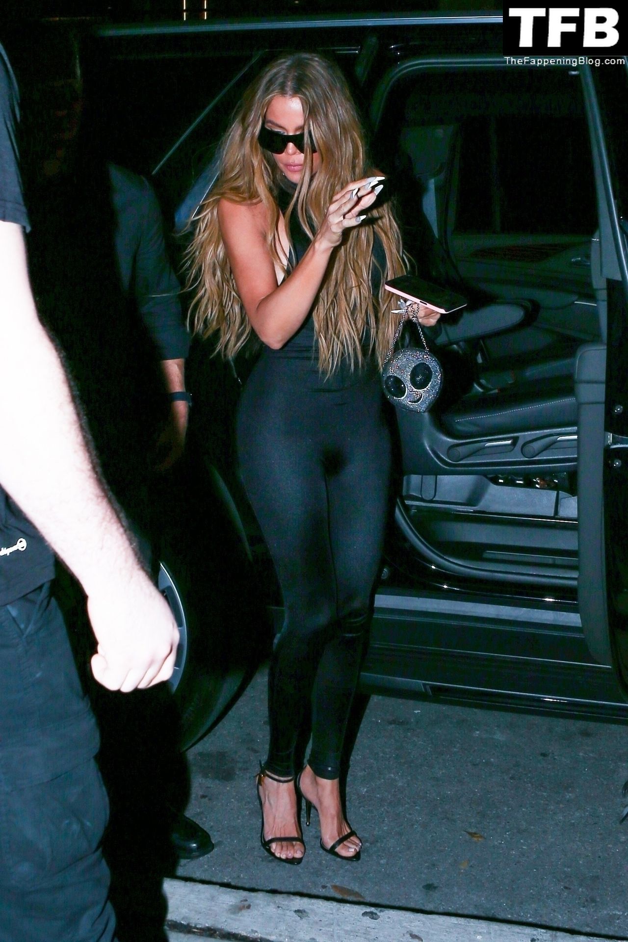 Kim Kardashian Brings Out Her Famous Curves for a Dinner Date in Miami with Khloe Kardashian (12 Photos)