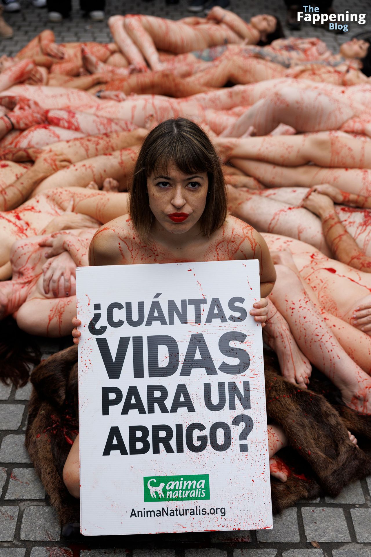 AnimaNaturalis Activists Lay on the Ground Against the Fur Industry in Madrid (4 Photos)