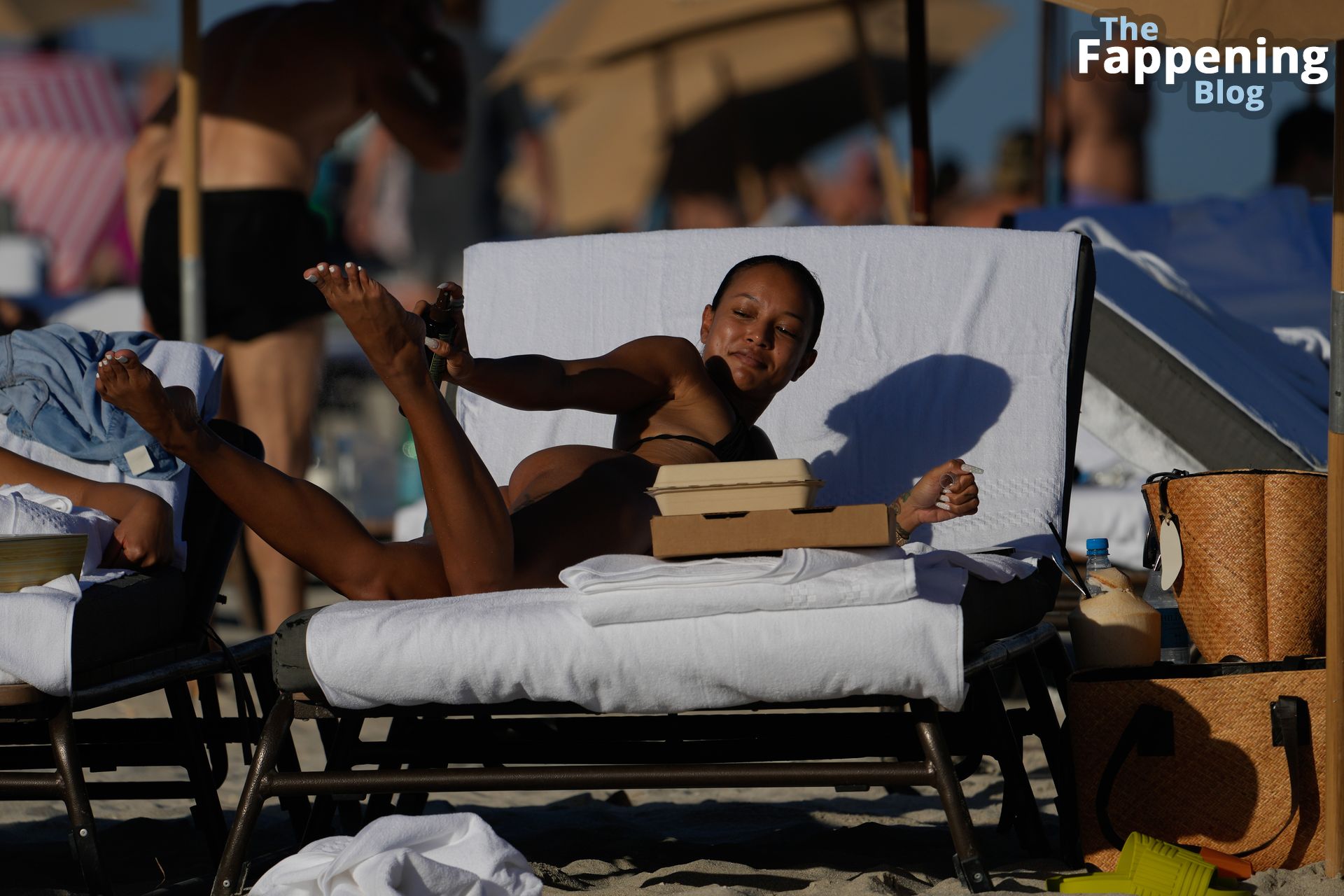 Karrueche Tran Wears a Black bikini as She Tops Up Her Tan on the Beach in Miami (37 Photos)