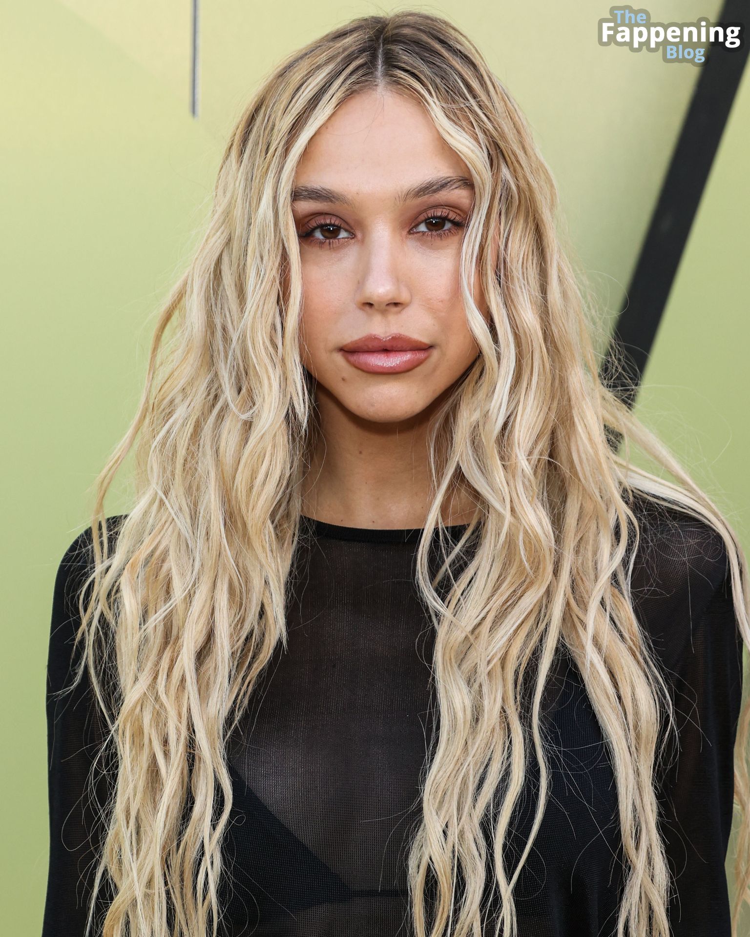 Alexis Ren Looks Stunning at the Versace Fall/Winter 2023 Fashion Show in WeHo (16 Photos)