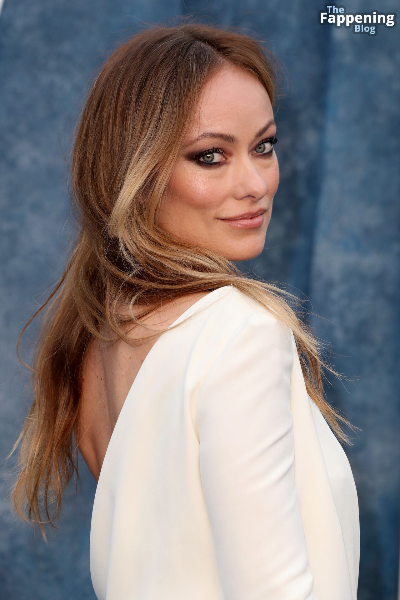 Olivia Wilde Displays Her Black Bra Posing in a White Dress at the Vanity Fair 95th Oscars Party (63 Photos)