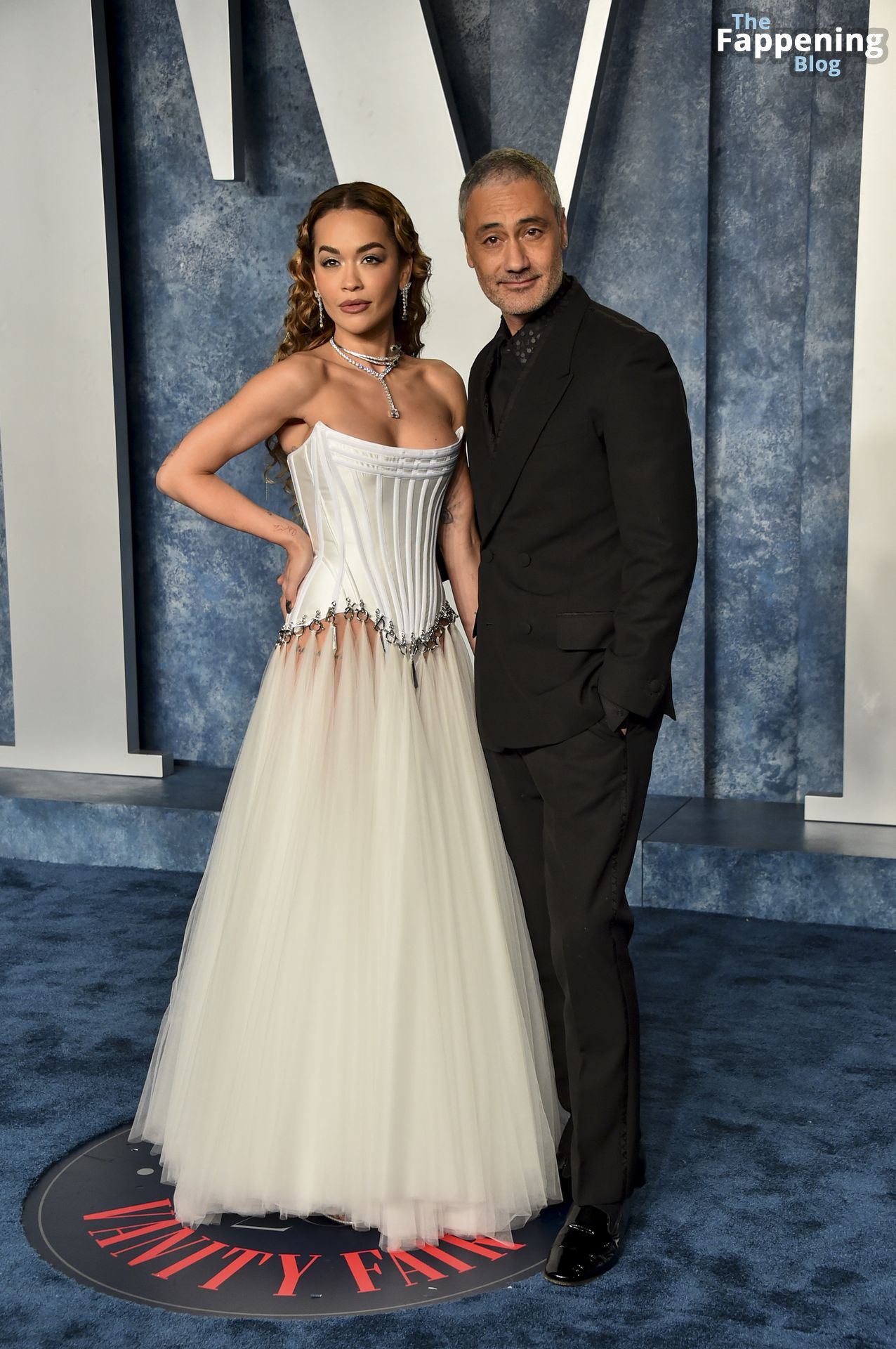 Rita Ora Displays Nice Cleavage in a White Corset Dress at the 2023 Vanity Fair Oscar Party (12 Photos)