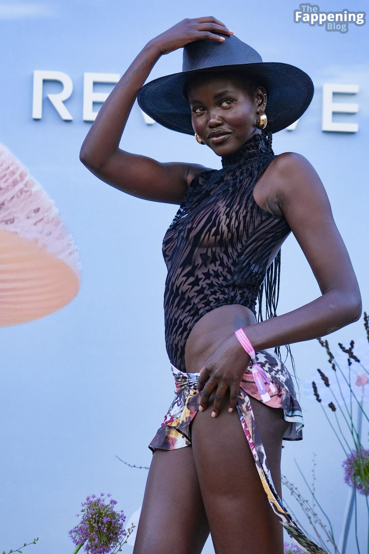 Adut Akech Displays Her Sexy Tits &amp; Legs at the Revolve Festival at Coachella (16 Photos)