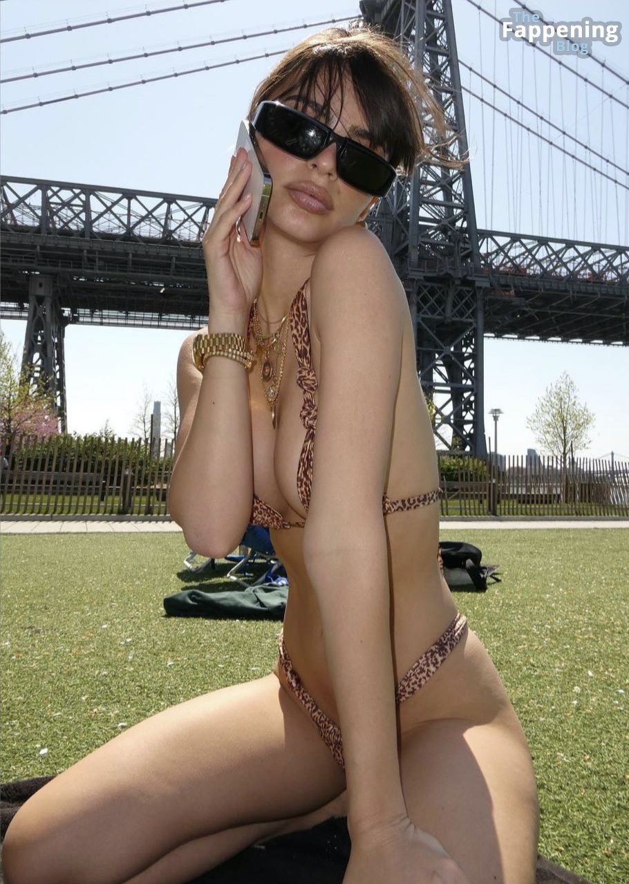 Emily Ratajkowski Shows Off Her Curves in Bikinis (14 Photos)