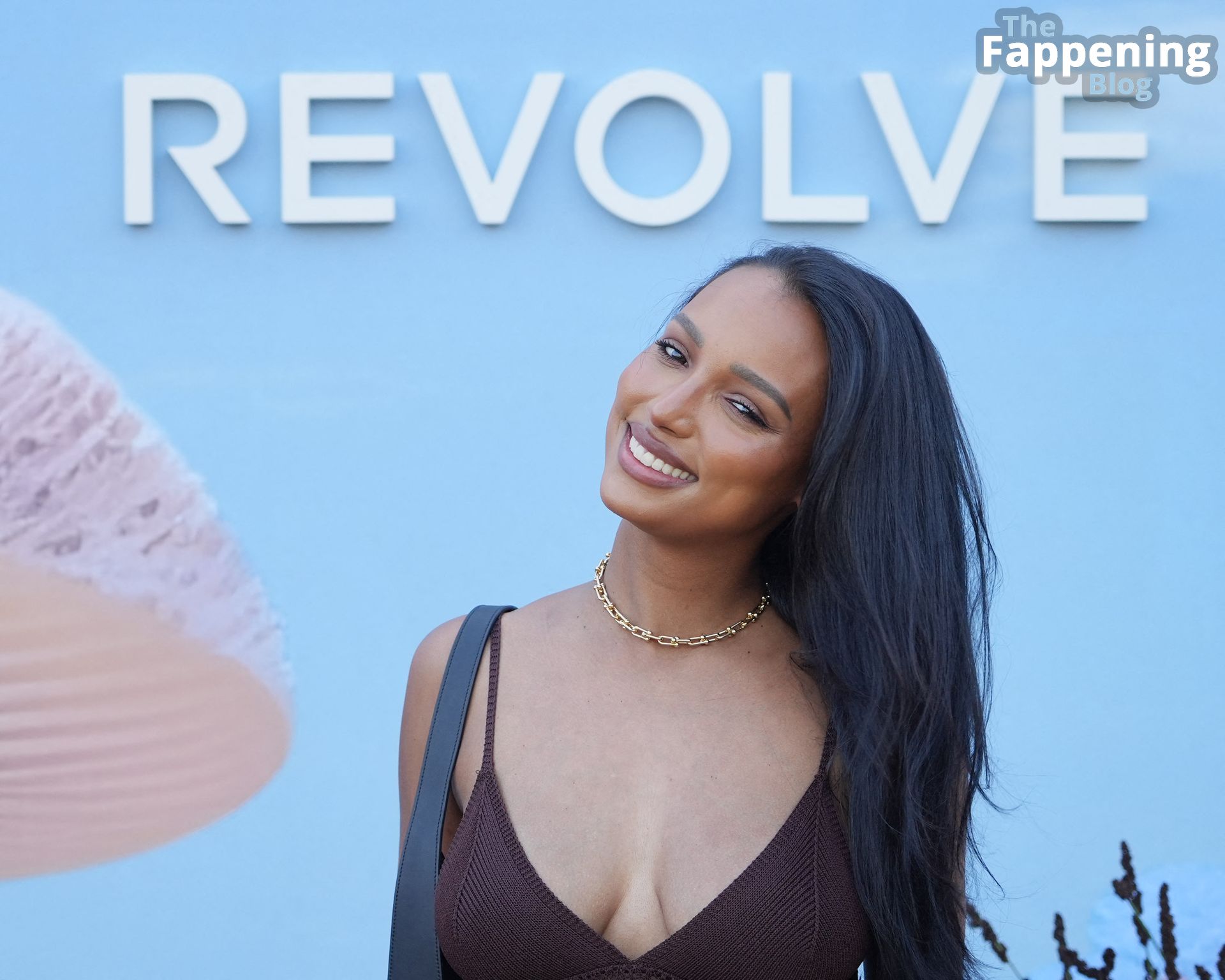 Jasmine Tookes Looks Sexy in a Bikini and Coverup at Revolve Festival at Coachella (6 Photos)