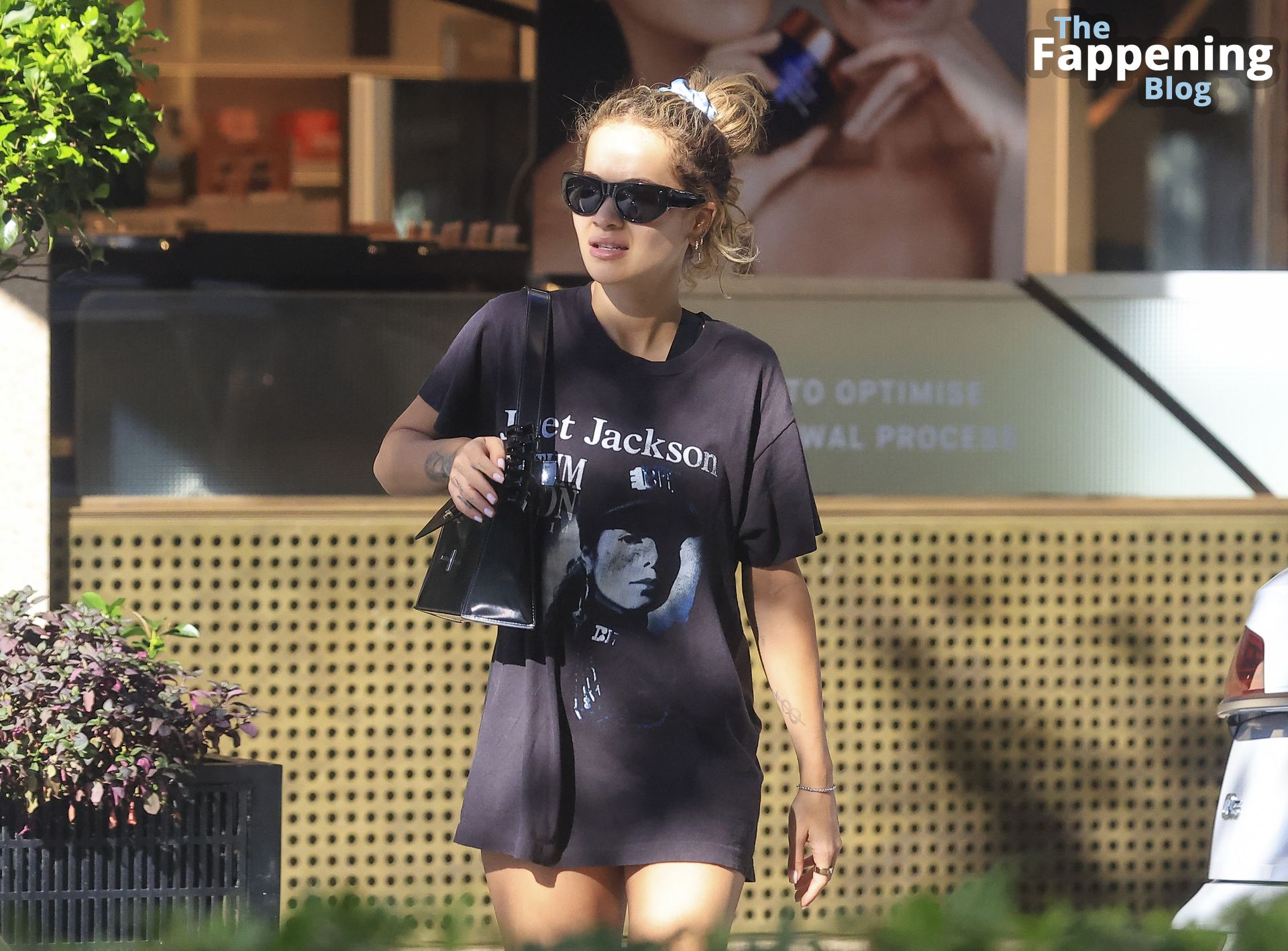 Rita Ora is Spotted Wearing a Vintage Janet Jackson ‘Rhythm Nation 1990’ Tour T-shirt on an Outing in Sydney (20 Photos