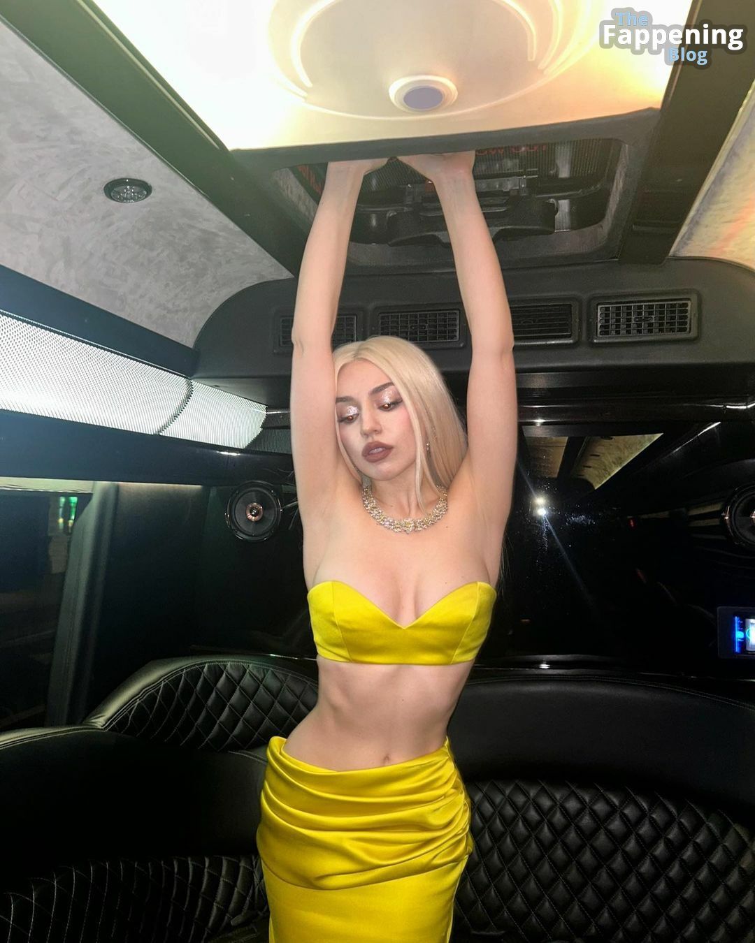 Ava-Max-Yellow-Outfit-Braless-Cleavage-5-thefappeningblog.com_.jpg