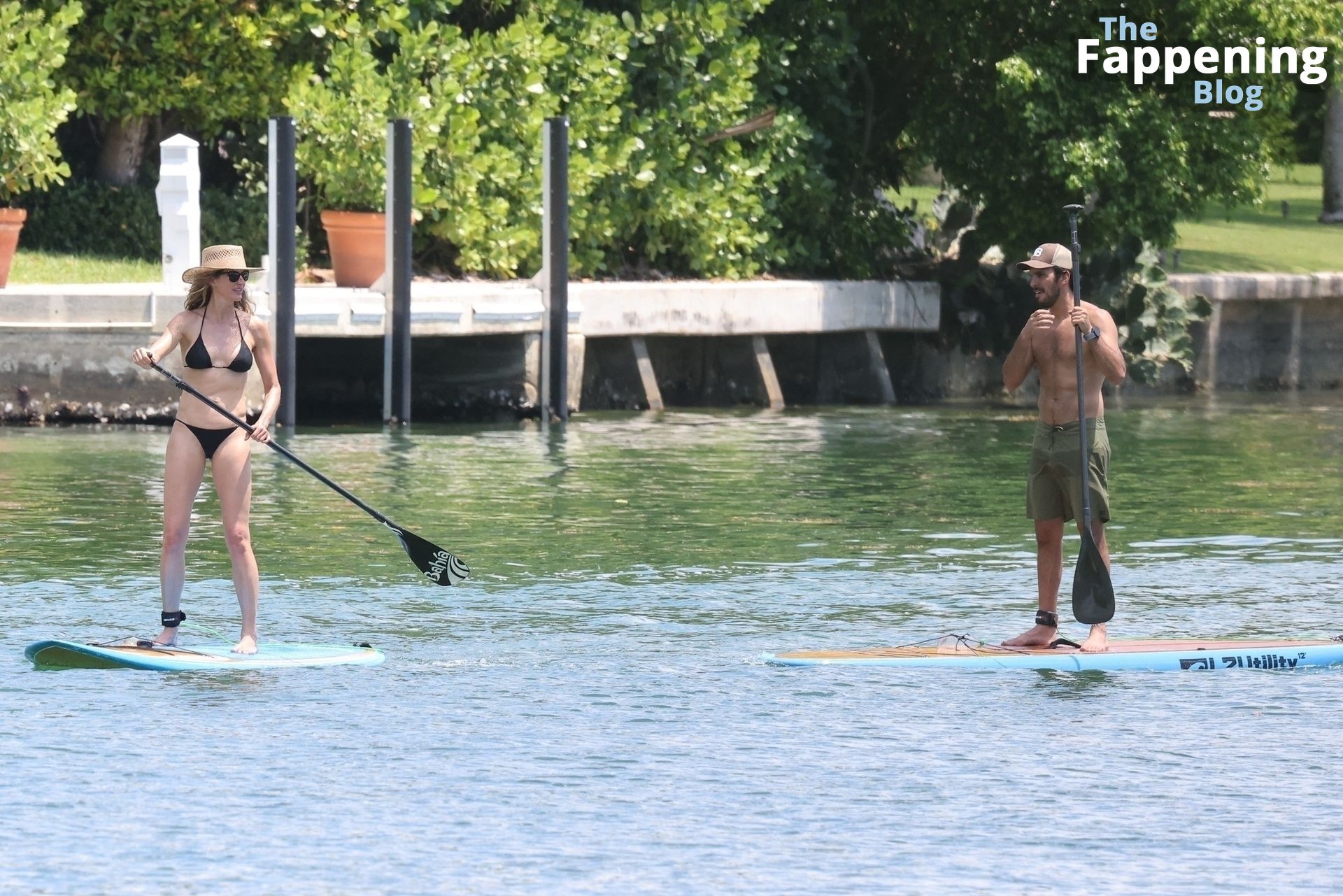 Gisele Bundchen Slips Into a Black Bikini for a Paddle Board Session in Miami (142 Photos)