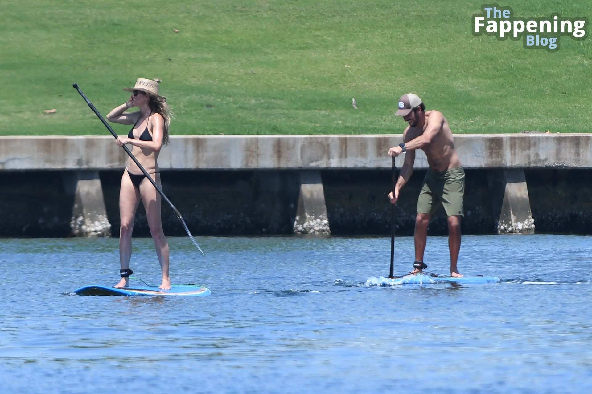 Gisele Bundchen Slips Into a Black Bikini for a Paddle Board Session in Miami (142 Photos)
