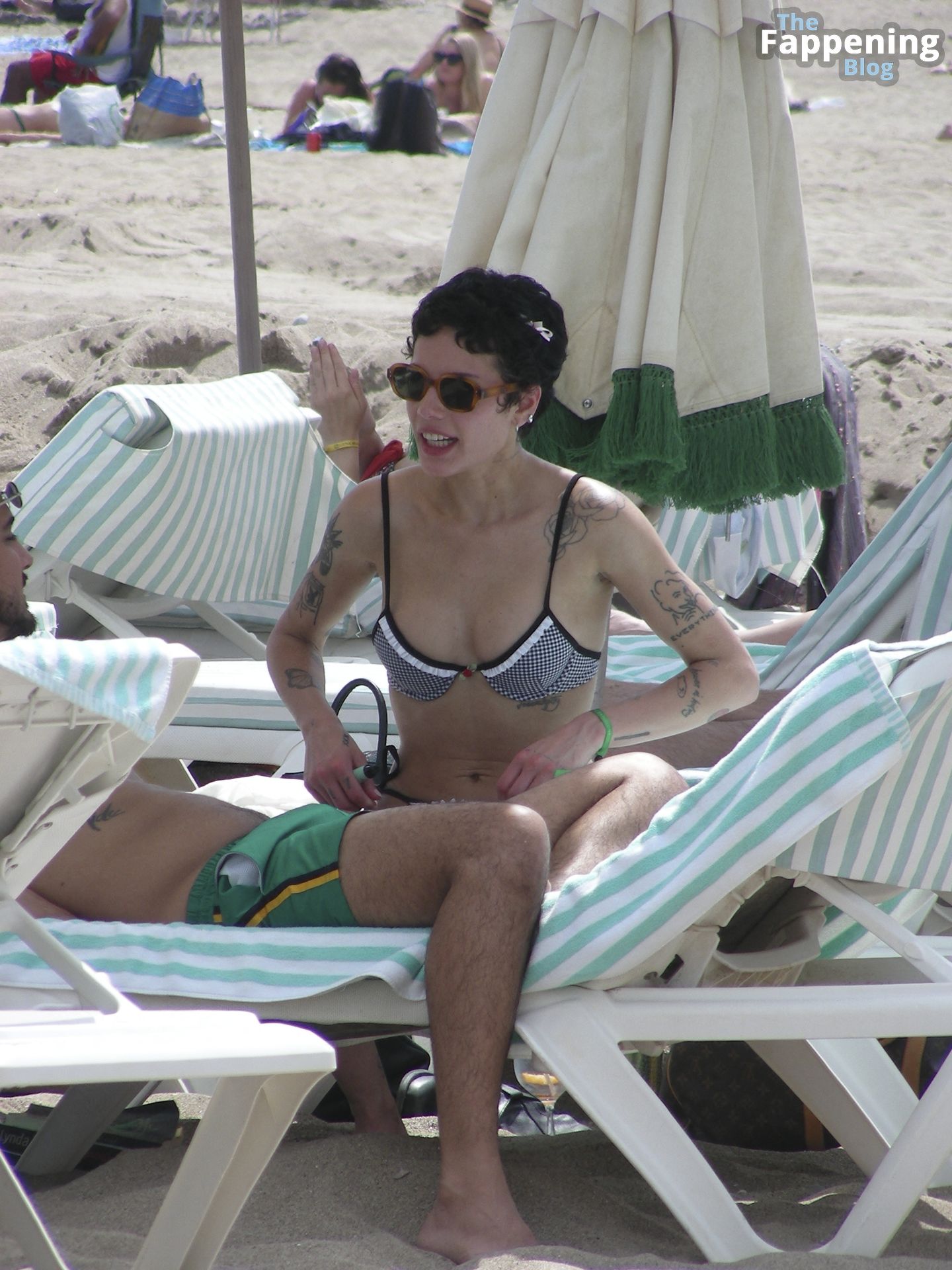 Halsey Shows Off Her Tattooed Body in a Skimpy Bikini While Relaxing on a Beach in Spain (22 Photos)
