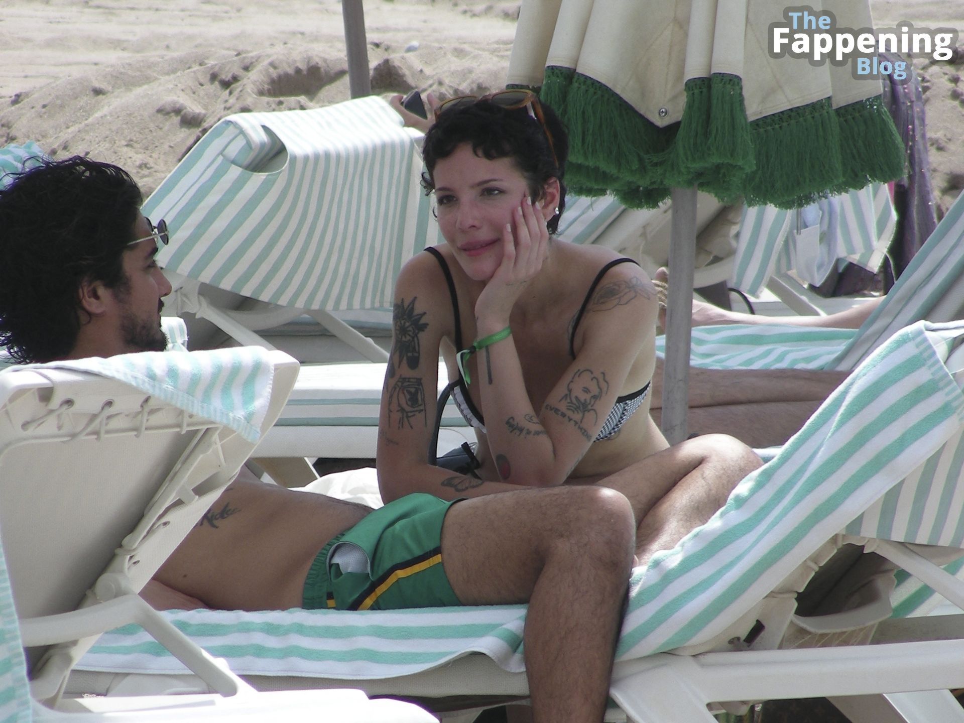 Halsey Shows Off Her Tattooed Body in a Skimpy Bikini While Relaxing on a Beach in Spain (22 Photos)