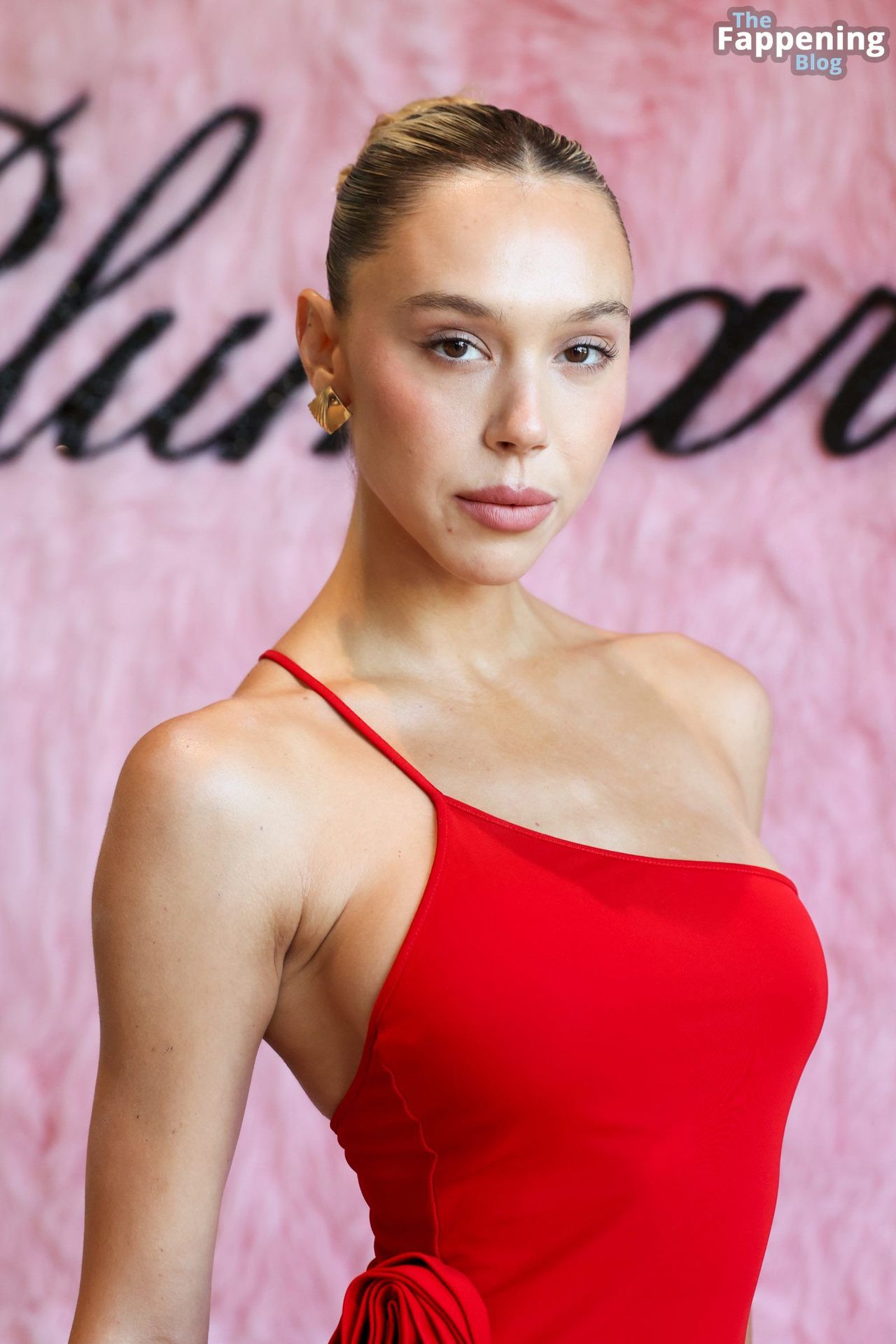 Alexis Ren Displays Her Slender Figure in a Red  Dress at Blumarine’s Pre-Fall 2023 Soiree (12 Photos)