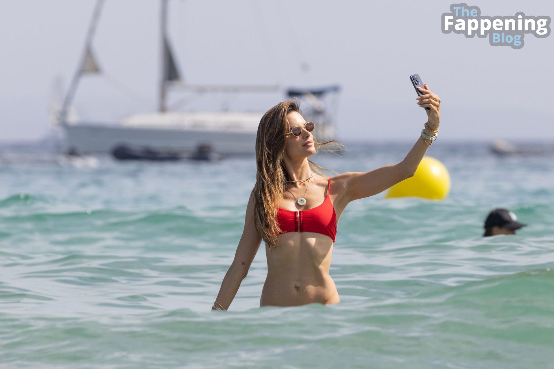 Alessandra Ambrosio Displays Her Sexy Figure in a a Red Bikini in Ibiza (24 Photos)