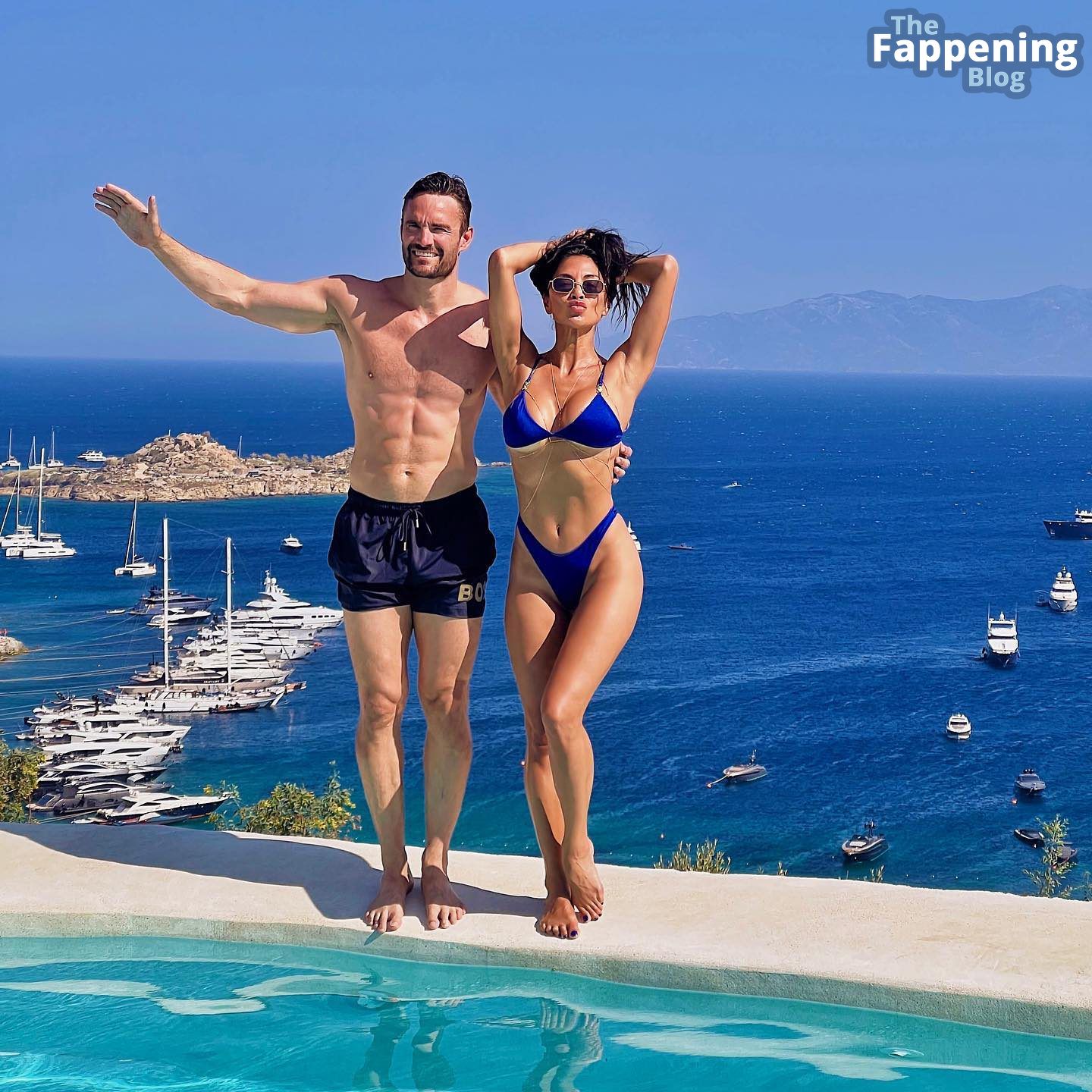 Nicole Scherzinger Displays Her Sexy Body in a Blue Bikini (12 Photos)